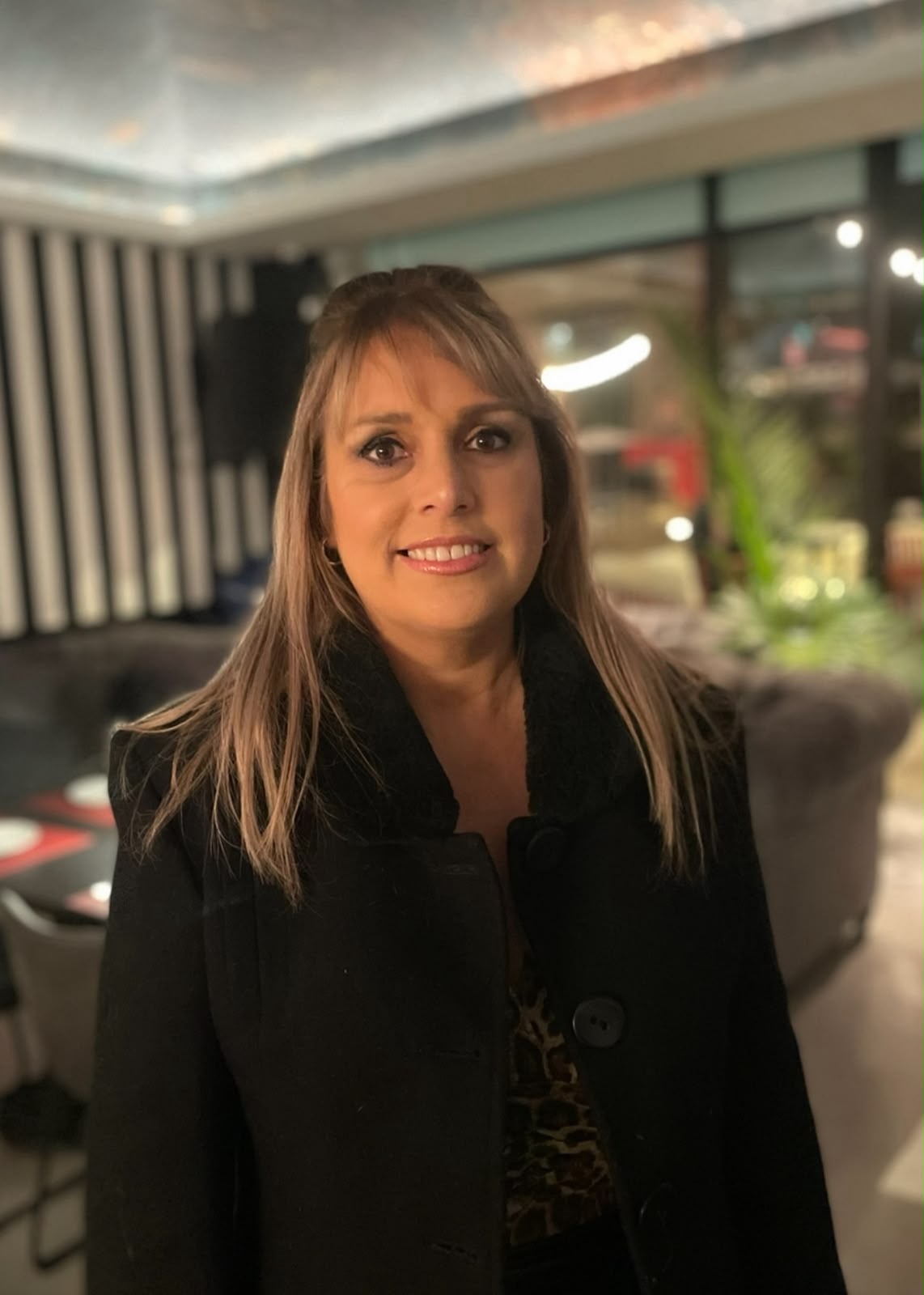 Retrato de Simone dos Santos sorrindo
